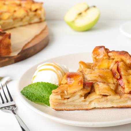 Indulgent Apple Pie Slice with Vanilla Ice Cream Scoop