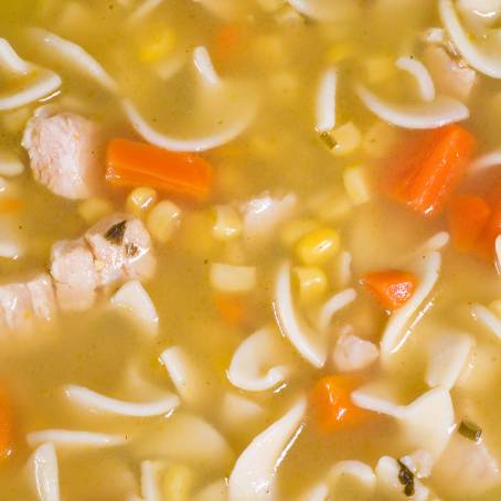 Isolated Chicken Broth from Noodle Soup Classic Comfort Food, Savory and Warm Homemade Delight