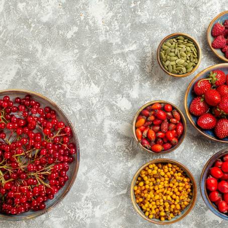 Isolated Cranberries with Leaves on White Background Full Depth of Field, Top View of Berries