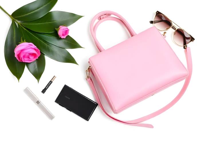 Isolated Female Pink Handbag with Accessories Stylish and Modern on White Background