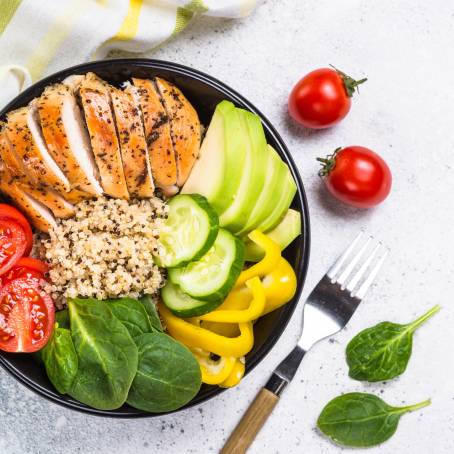 Isolated Fresh Salad Bowl with Spinach, Cherry Tomatoes, Lettuce, Cucumber and Various Vegetables