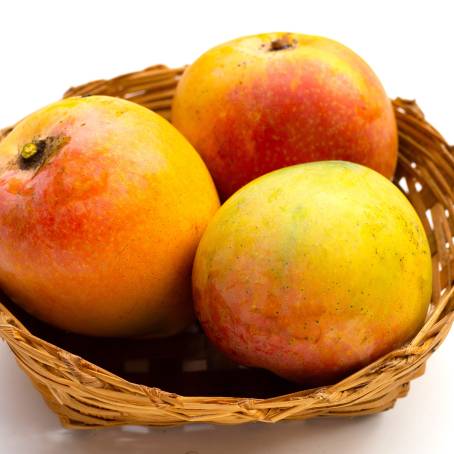 Isolated Fresh Yellow Mango from Above on White Background, Ideal for Tropical Food Photography