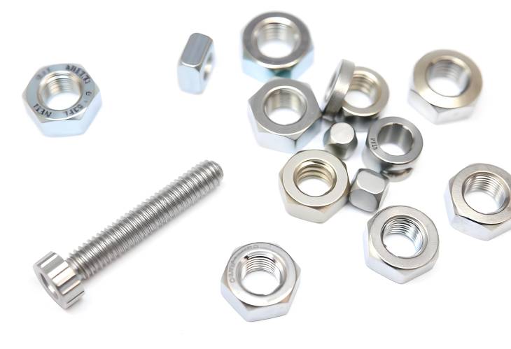 Isolated Metal Screw and Nuts on White Background Essential for Mechanical Projects