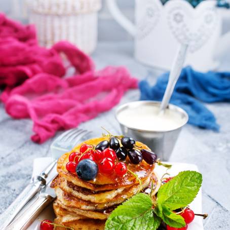 Isolated Pancake with Mixed Berries on White Background