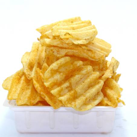 Isolated Pile of Fluted Potato Chips