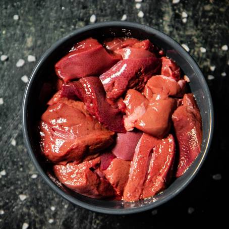 Isolated Top View of Fresh Raw Pork Liver Ready for Cooking on White Background