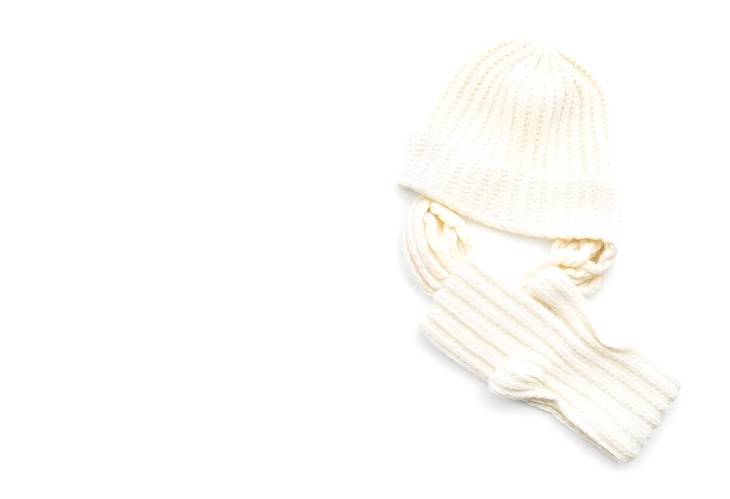 Isolated White Knitted Winter Set Hat, Scarf, and Gloves on White Background