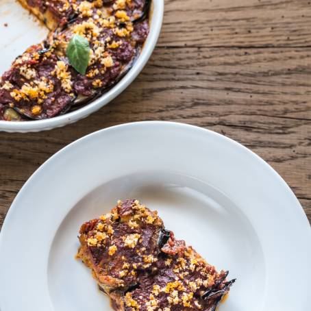 Italian Parmigiana di Melanzane, Baked Eggplant with Cheese and Tomatoes Traditional Sicilian Cuisie