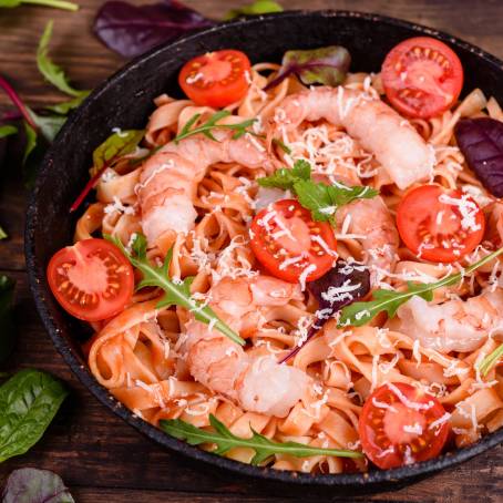 Juicy Shrimps Cooked with Fresh Herbs and Garlic in a Pan