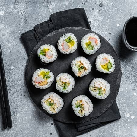 Korean Food Gimbap Top View of Fresh Rolls on White Background, Ready to Eat