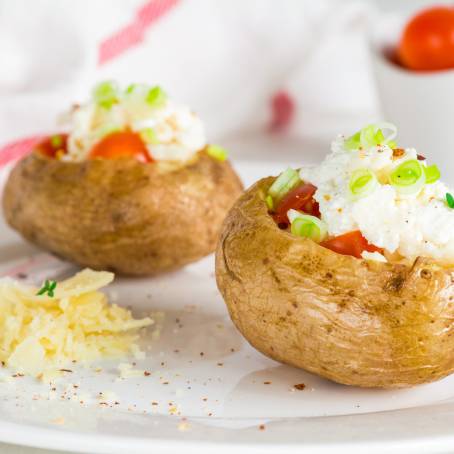 Loaded Potato Skins with Cheddar Cheese on Platter