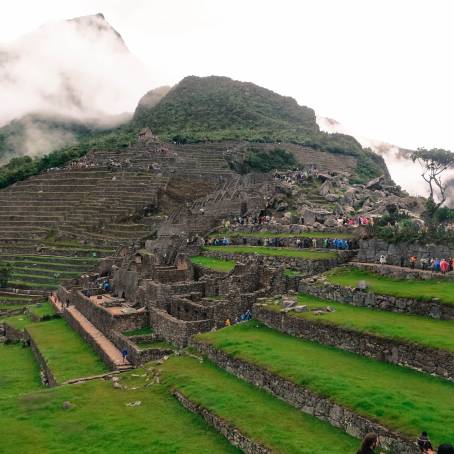 Machu Picchu Ancient Ruins Amidst Mist and Lush Mountains