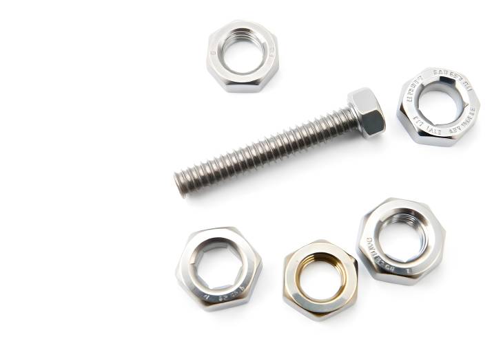 Metal Screw with Nuts Isolated on White Key Hardware for Repairs and Assembly