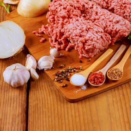 Minced Pork with Parsley on Isolated White Plate