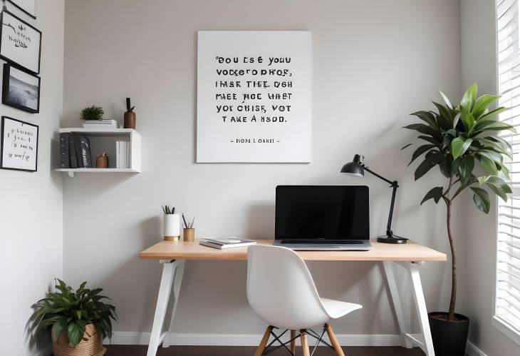 Modern Minimalist Workstation with Sleek Desk, Laptop, and Inspirational Quotes on Wall