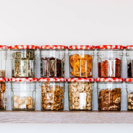 Nutritious Cookies with Dried Fruits and Nuts in Glass Jar