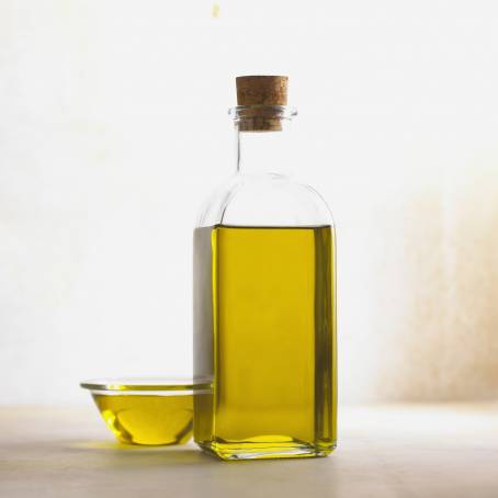 Olive Oil on White Background High Quality Ingredient Viewed from Above