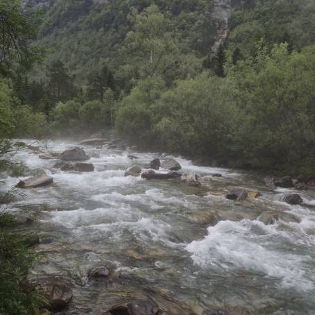 Ordesa Valley Waterfall and Majestic Mountain Backdrop  Ordesa and Monte Perdido National Park