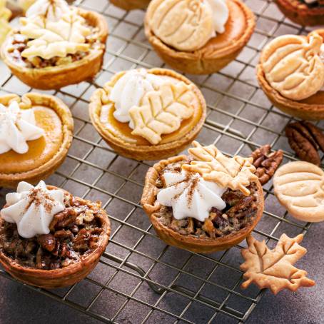 Overhead View of Fall Pies Pumpkin, Pecan, Apple Crumble