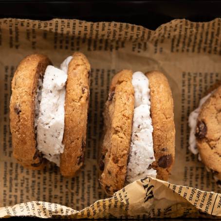 Overhead View of Ice Cream Sandwiches with Nuts, Caramel, and Chocolate Chip Cookies