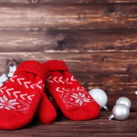 Pair of Red Christmas Mittens Knitted with Pattern, Isolated on White Background