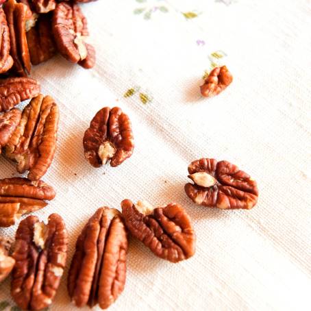 Peeled Pecans Isolated on White Background