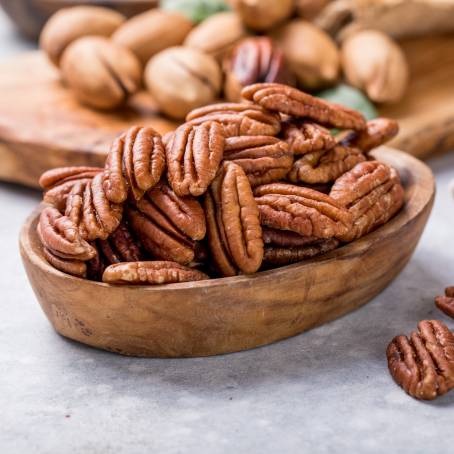 Peeled Pecans on Bright White Background