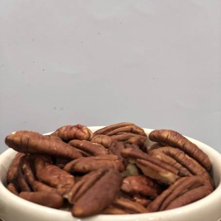 Peeled Pecans on Isolated White Surface