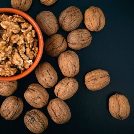 Peeled Walnuts CloseUp on White Isolated Background