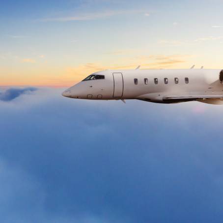 Plane in Vibrant Blue Sunset Sky