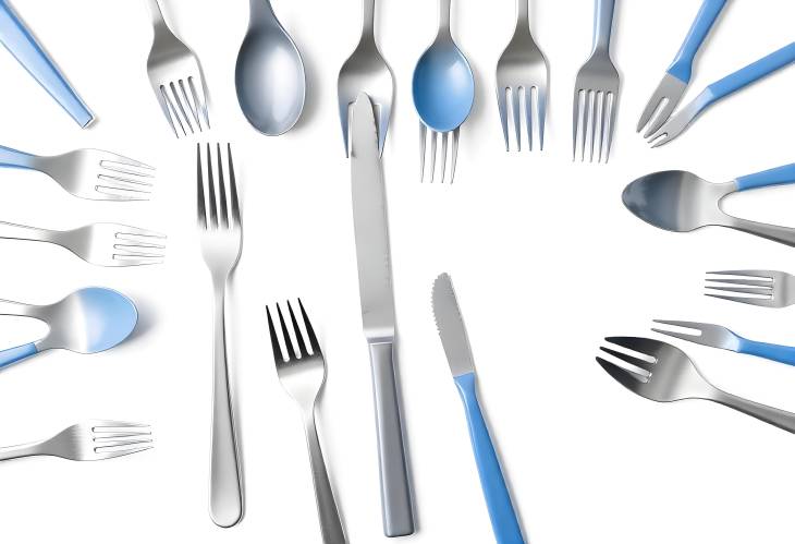 Plastic Cutlery Set on White Background Forks, Knives, and Spoons Isolated