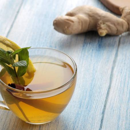 Pure Lemon Ginger and Green Tea A Healthy Pair Isolated on White