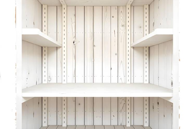 Quiet Elegance Empty White Shelves on a Rustic Rack