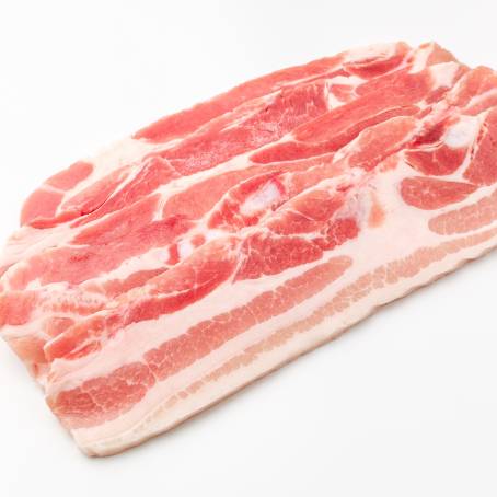 Raw Pork Belly on Black Plate Top View for Cooking and Food Prep