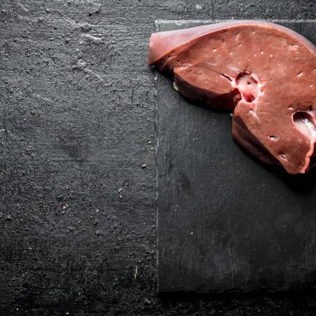 Raw Pork Liver Top View Isolated Fresh and Ready for Cooking on White Background