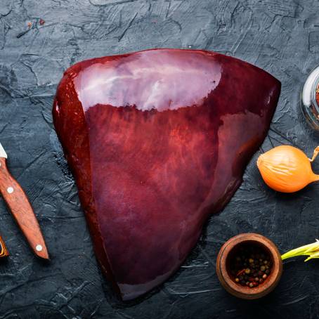 Raw Pork Liver Top View Isolated on White Background, Ready for Cooking and Meal Prep