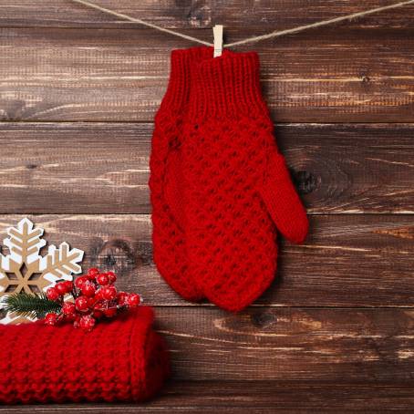 Red Christmas Pattern Knitted Mittens Pair Isolated on White Background for Festive Season