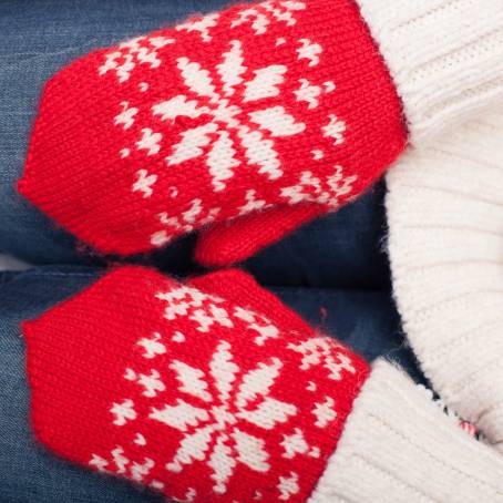 Red Knitted Mittens with Christmas Pattern Pair Isolated on White Background for Holidays