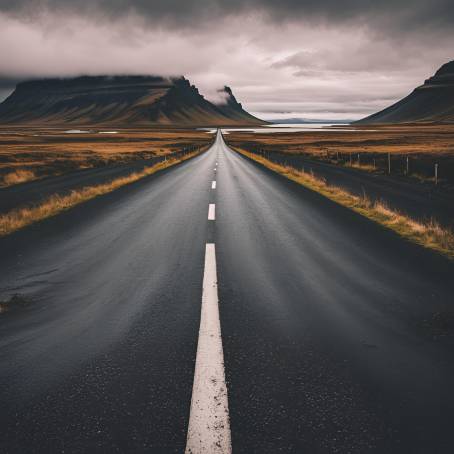 Roadway with Road Markings Leading to Icelandic Lake View