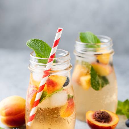 Rustic Outdoor Peach Lemonade Drink Station Setup