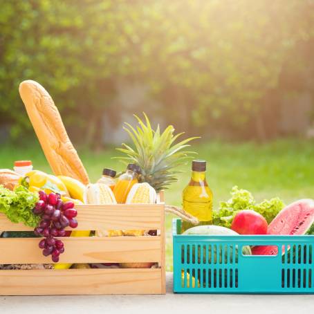 Rustic Wooden Crate with Assorted Fresh Fruits and Vegetables