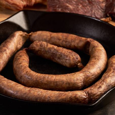 Savory Italian Sausage with Cheese and Herbs in Cast Iron Pan