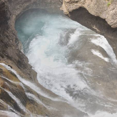 Scenic Waterfall in Ordesa Valley with Mountain Range Above  Ordesa and Monte Perdido National Par