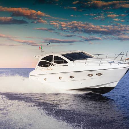 Sleek Motorboat Gliding on Peaceful Water