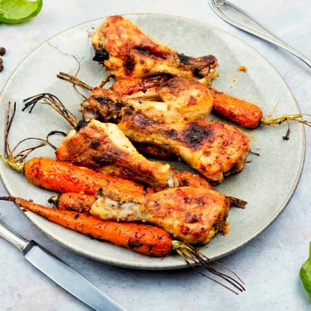 Spicy Chicken Drumsticks Flying with Vegetables and Herbs, BBQ with Floating Spices