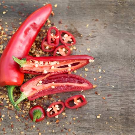 Spicy Red Cayenne Pepper on White Background CloseUp