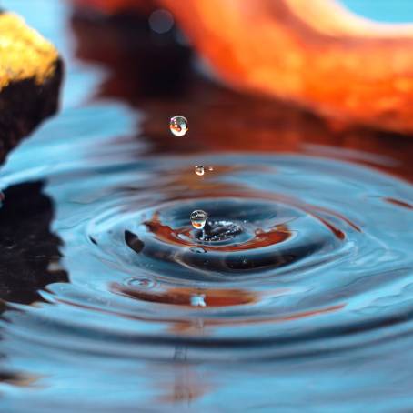 Splashing Blue Water Drop Liquid and Abstract