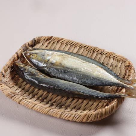 Spotted Mackerel Fish on White Plate TopDown Fresh Seafood Ready for Cooking