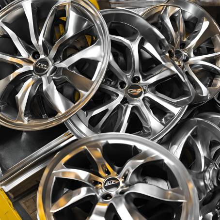 Stunning Alloy Wheels Featured in a Chic Shop Display Perfect for Vehicle Enhancement