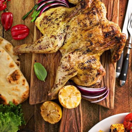 Sumptuous Grilled Chicken and Veggies on Wooden Table Surface